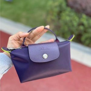 Longchamp mini pouch purple color